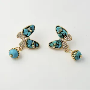 Vintage gold butterfly earrings with turquoise inlay, rhinestones and pearl accents