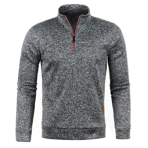 Close-up detail of a men's quarter-zip grey melange knit sweater with fleece lining