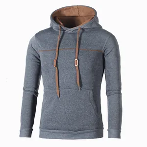 Detailed view of casual hoodie showing contrast hood lining, chest piping and front pocket.