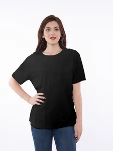Front view of black short-sleeve chemo shirt with chest pocket on female model