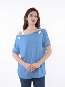Detailed view of a blue chemo shirt featuring functional shoulder port access snaps