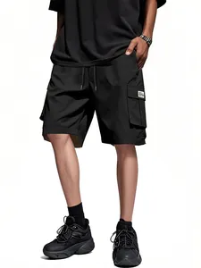 Detailed view of men's black cargo shorts featuring multi-pockets and relaxed fit