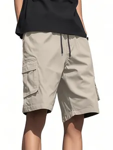 Close-up detail of men's loose fit cargo shorts with multi-pockets in khaki beige