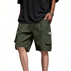 Stylish men's army green loose cargo shorts with multi-pockets for summer casual wear