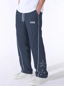 Men's navy blue high street athletic pants with side stripes and star embroidery