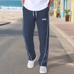 Men's high street navy blue sports pants with white star embroidery details