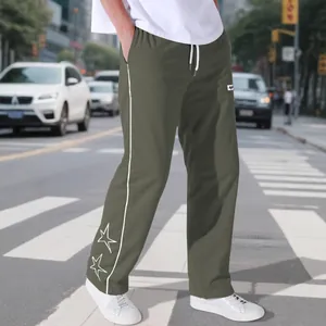 Men's high street olive green joggers with white side stripe and embroidered stars