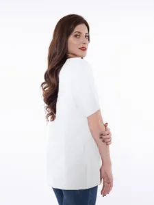 Side view of a white unisex post-surgery recovery shirt with soft breathable fabric.