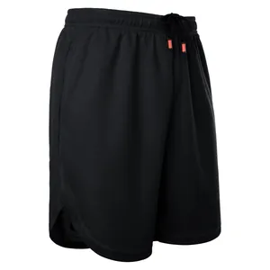 Close-up detail of black men's quick-dry marathon running shorts with mesh texture