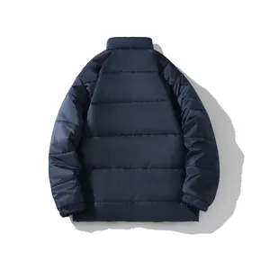 Detailed back view of a navy blue quilted puffer jacket with stand collar for winter