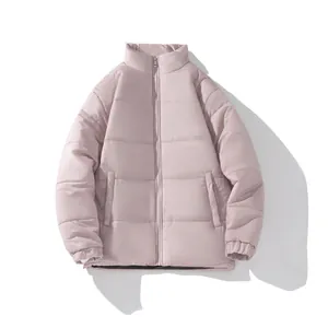 Front view of a stylish dusty pink quilted puffer jacket featuring a warm stand collar