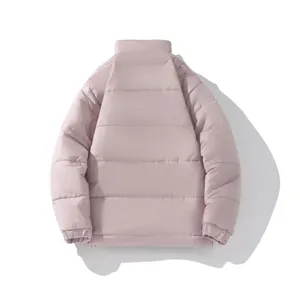 Detail view showing the back of a light pink quilted puffer jacket with stand collar