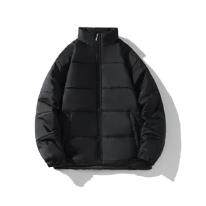 Front view of a minimalist black unisex winter padded puffer jacket with stand-up collar