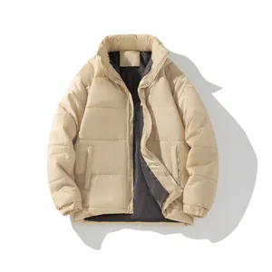 Stylish unisex beige winter puffer jacket with stand collar and zipper closure on white