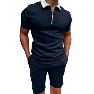 Men's navy blue polo set featuring a white zipper collar and matching shorts detail.