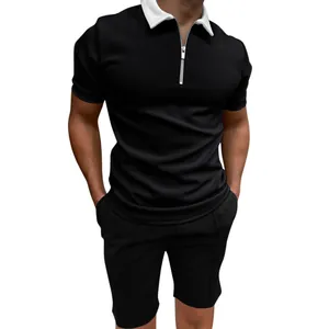 Detailed view of men's slim fit black polo shirt featuring a white zipper collar