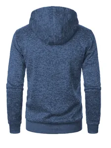 Close-up back view of blue jacquard knit men's hooded jacket with ribbed cuffs.
