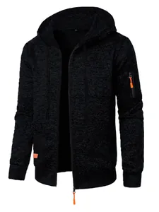 Close-up of men's black knit hooded cardigan with vibrant orange zipper accents