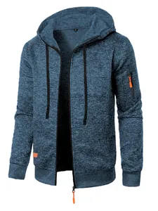 Macro view of blue heathered knit texture on men's hooded zip-up cardigan jacket