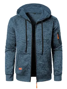 Detailed view of the blue jacquard knit texture on men's hooded zip-up sweatshirt.
