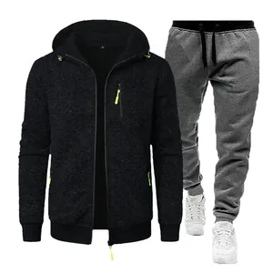 Men's sports tracksuit set featuring a black hooded jacket and grey knit sweatpants