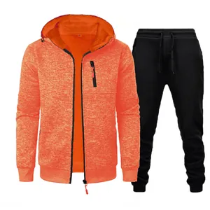 Detailed view of men's orange marl zip-up hoodie and black joggers tracksuit set.