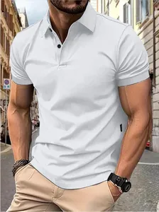 Detailed shot of a classic white slim-fit men's polo shirt worn in an outdoor setting