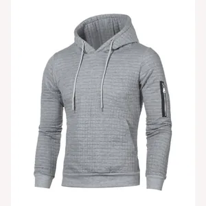 Sweat à capuche matelassé gris pour homme avec poche zippée sur la manche et cordon