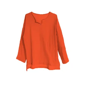 Detailed view of an orange cotton linen long sleeve shirt for men with a V-neckline