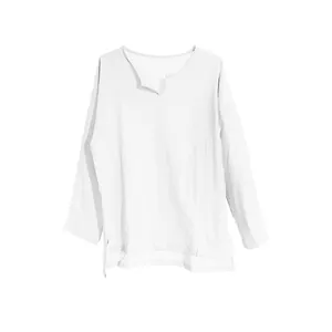 Detailed macro view of white loose-fit cotton linen long-sleeved shirt with V-neck