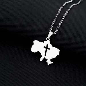 Detailed view of silver stainless steel Ukraine map necklace with hollow cross pendant