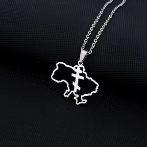 Detailed close-up of Ukraine map pendant with cross cutout on stainless steel chain