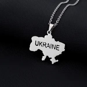 Detailed close-up of Ukraine map pendant necklace in polished stainless steel