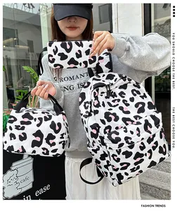 Detailed view of leopard print backpack 3-piece set with matching lunch bag and pouch