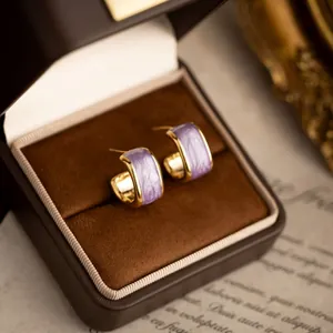Elegant French vintage purple gold-toned enamel hoop earrings inside a luxury jewelry box
