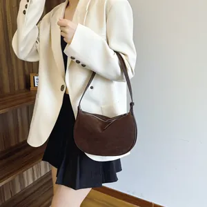 Stylish dark brown suede underarm bag for women with a minimalist crescent design