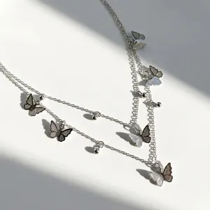 Elegant Double Layer Butterfly Pendant Necklace Alloy Multi Layered Chain For Women Personal Temperament Jewelry Decoration