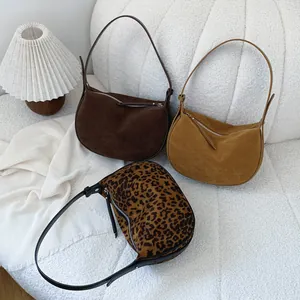 Collection of stylish frosted leopard print and solid color underarm dumpling bags for women