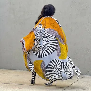 Back view of women's autumn loose printed kimono windbreaker with zebra patterns