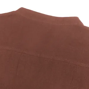 Macro detail of brown medieval renaissance warrior shirt stand collar and stitching