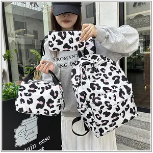 Three-piece student backpack set with stylish leopard print including matching lunch bag