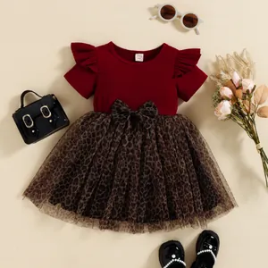Adorable girls burgundy ribbed short sleeve dress featuring leopard print tulle skirt and bow