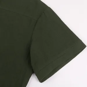 Close-up of the high-quality dark green fabric texture on a medieval shirt sleeve