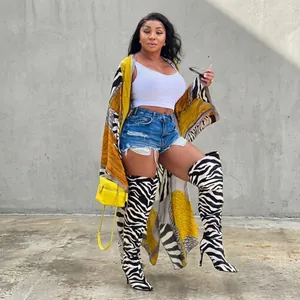 Detailed view of stylish autumn printed loose kimono windbreaker with zebra patterns