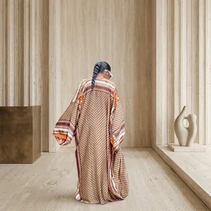 Full-length back view of a loose autumn printed kimono windbreaker with geometric patterns