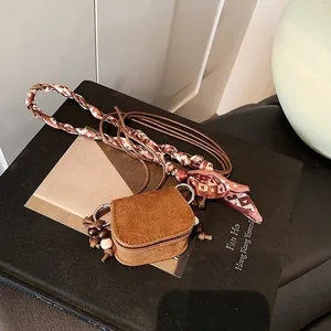 Vintage brown suede mini crossbody coin purse with heart patterned silk scarf strap