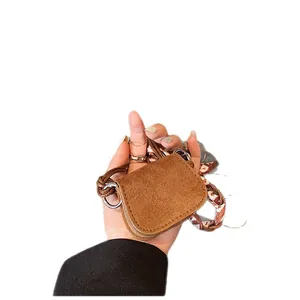 Vintage brown suede mini crossbody coin purse featuring a silk scarf shoulder strap