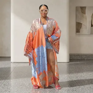 Bohemian style floral print loose long-sleeved kimono cardigan for women in vibrant orange