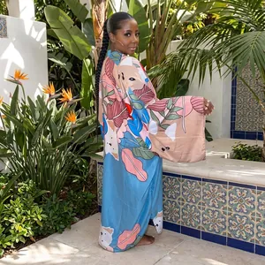 Stylish women's autumn floral print loose kimono robe in a vibrant cafe interior