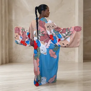 Detailed back view of a loose colorful floral and animal printed kimono robe with long sleeves